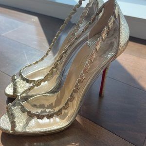 Christian Louboutin heels in metallic silver gold barely used